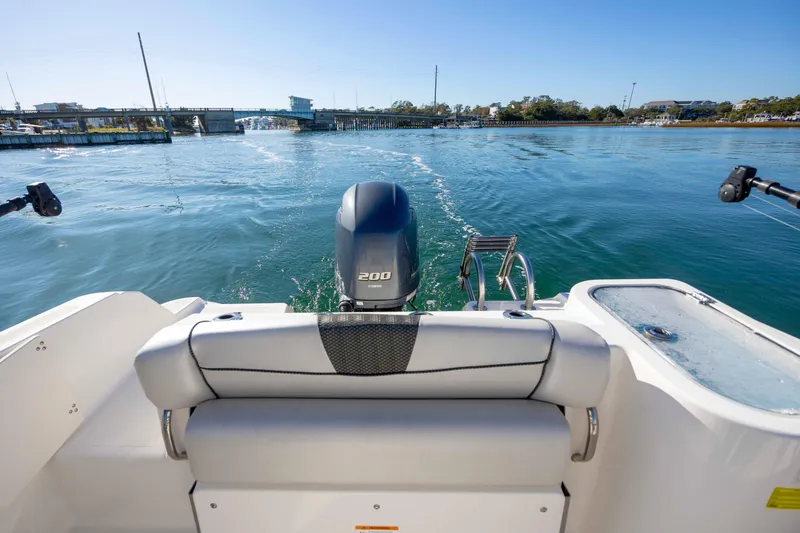 Slide: The Image of 2019 Wellcraft 222 Fisherman boat with Yamaha 200 engine on calm water. - 19