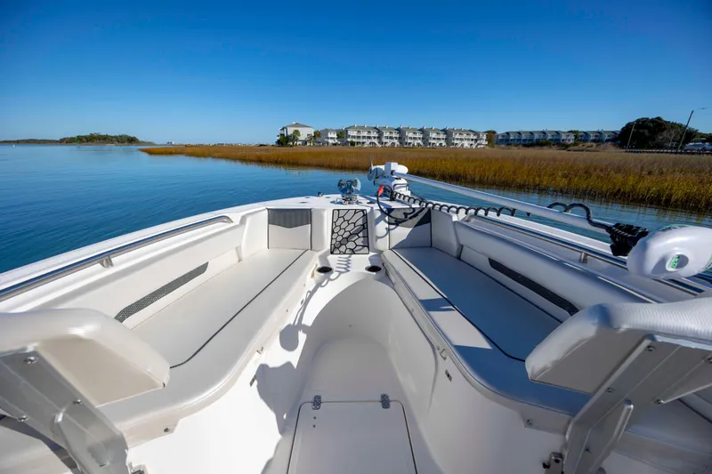 Slide: The Image of 2019 Wellcraft 222 Fisherman boat interior with scenic waterfront view. - 9