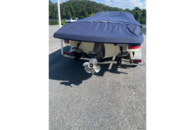 Slide: The Image of 2018 Chris-Craft Launch 23 boat with cover, rear view showing propeller. - 5