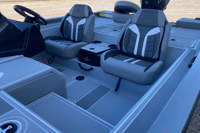 Slide: The Image of 2026 G3 Sportsman 1810 SE boat interior with modern seating and steering wheel. - 11