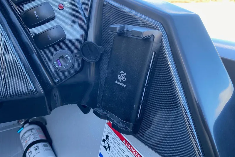 Slide: The Image of Dashboard of 2026 G3 Sportsman 1810 SE with AquaAmp device and controls. - 8