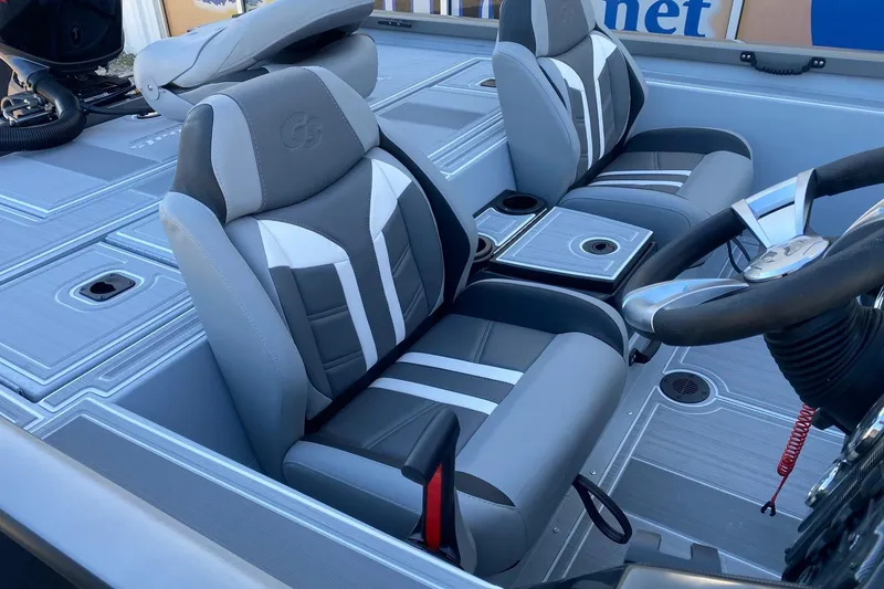 Slide: The Image of 2026 G3 Sportsman 1810 SE boat interior with sleek, modern seating and steering wheel. - 9