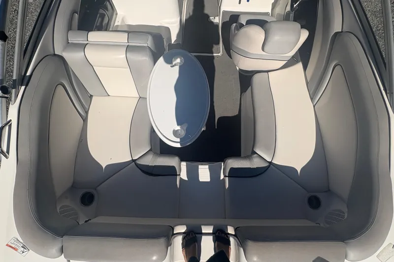 Slide: The Image of 2012 Yamaha Boats AR240 HO interior with seating and table, top view. - 10