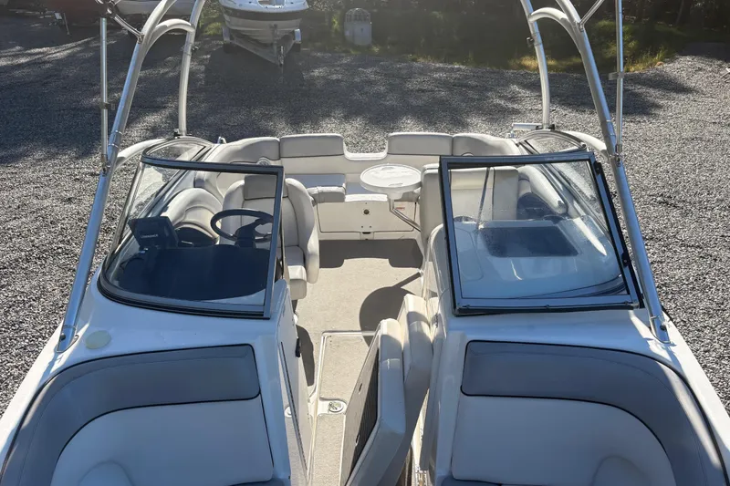 Slide: The Image of 2012 Yamaha Boats AR240 HO interior with open seating and steering wheel. - 20