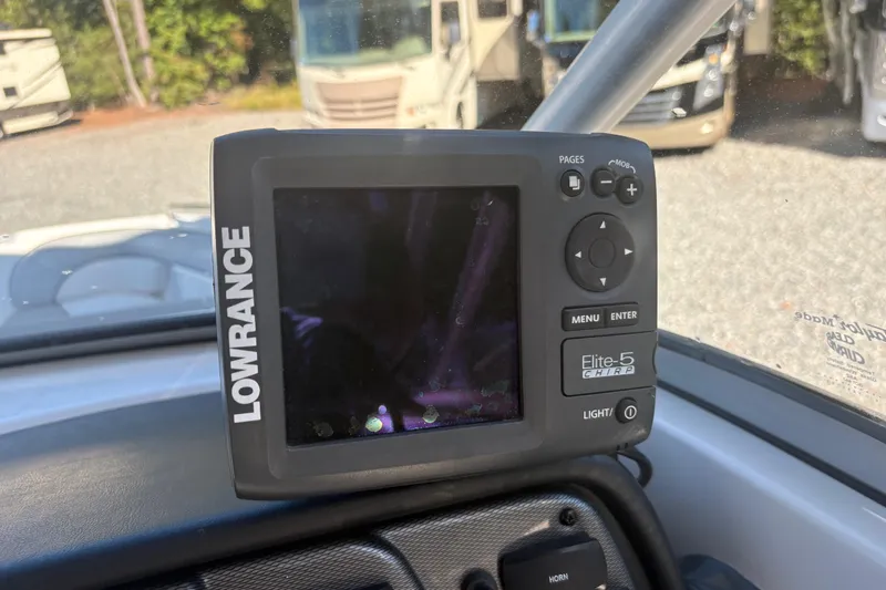 Slide: The Image of Lowrance Elite-5 CHIRP fishfinder on 2012 Yamaha Boats AR240 HO dashboard. - 21