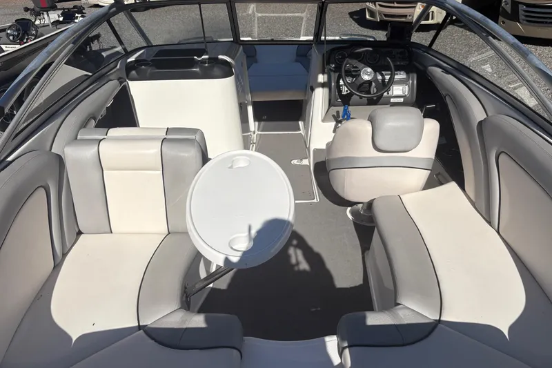 Slide: The Image of 2012 Yamaha Boats AR240 HO interior with seating and steering wheel. - 8