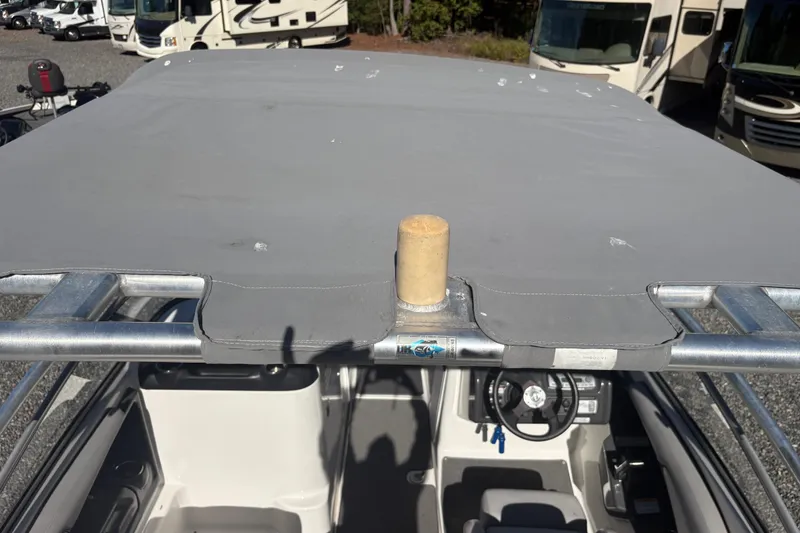 Slide: The Image of 2012 Yamaha Boats AR240 HO with covered cockpit and visible steering wheel. - 9