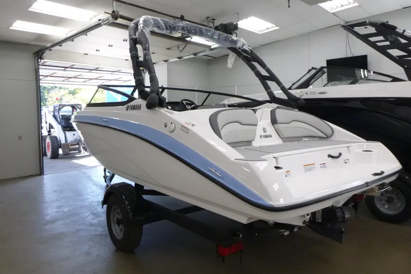 Slide: The Image of 2026 Yamaha Boats AR190 interior with sleek seating and modern dashboard design. - 7