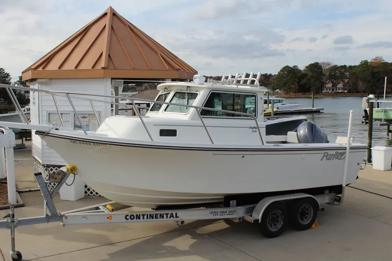 Slide: The Image of Parker Marine 2120 Sport Cabin 2014 - 2