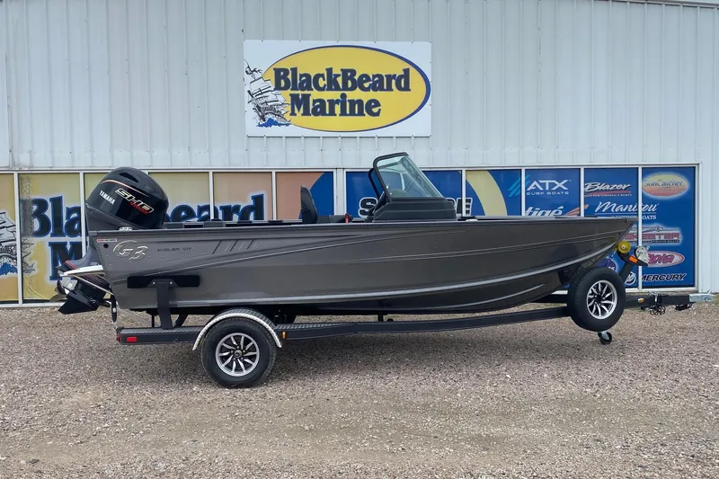 The Image of 2026 G3 Angler V17 FS boat on trailer at Blackbeard Marine dealership. - 1
