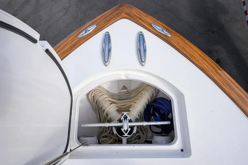 Slide: The Image of Bow of 2020 Valhalla V-33 boat with anchor and rope storage compartment. - 10
