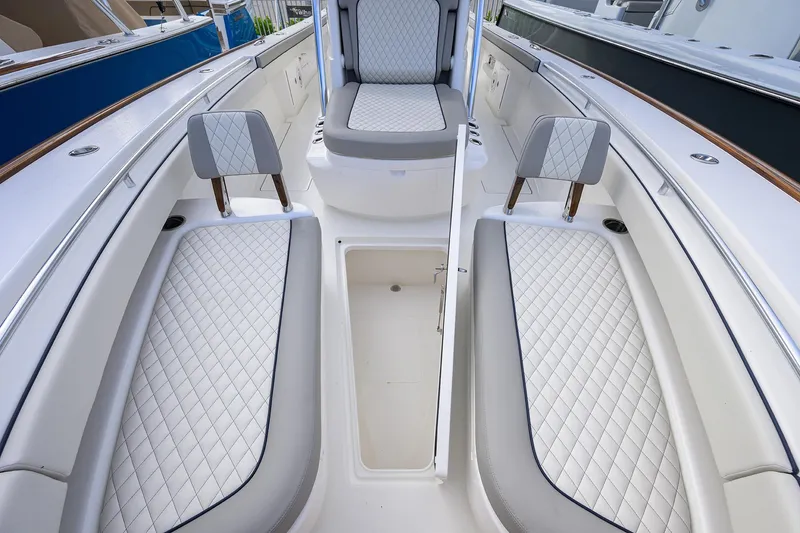 Slide: The Image of Luxurious interior of 2020 Valhalla V-33 boat with quilted seating and storage. - 11