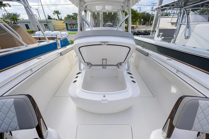 Slide: The Image of 2020 Valhalla V-33 boat interior with open storage compartment. - 12