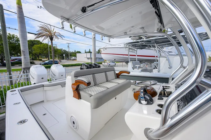 Slide: The Image of 2020 Valhalla V-33 boat interior with sleek seating and modern controls. - 15