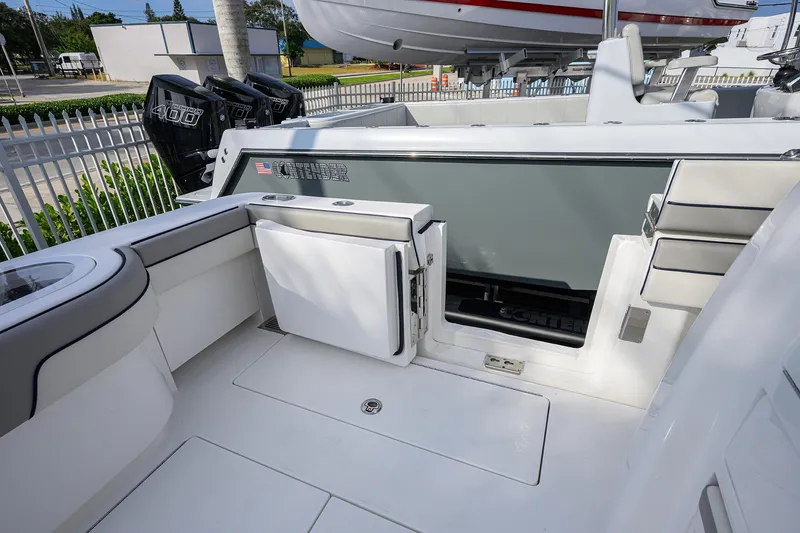 Slide: The Image of 2020 Valhalla V-33 boat interior with seating and storage compartments. - 21