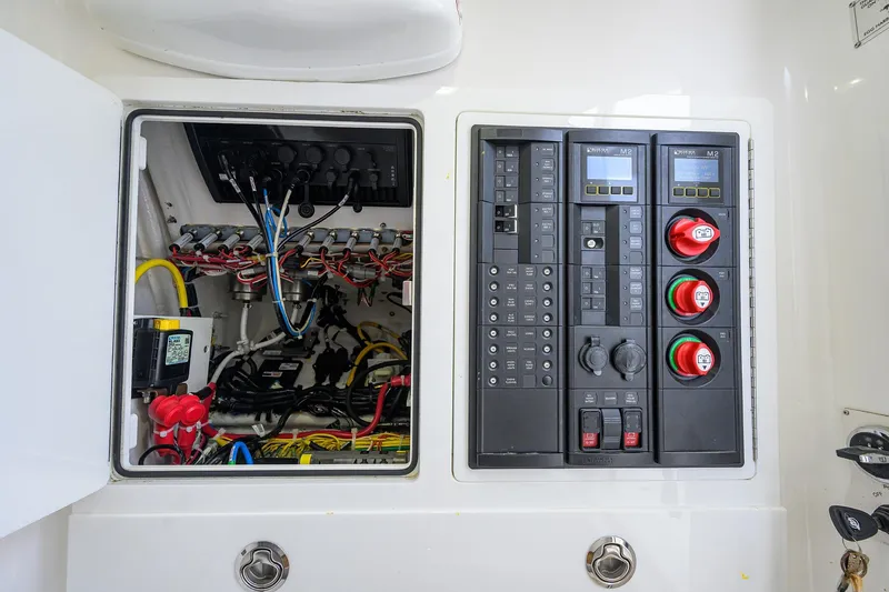 Slide: The Image of Electrical panel of 2020 Valhalla V-33 boat, showcasing wiring and control systems. - 27