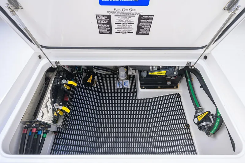 Slide: The Image of Open hatch of 2020 Valhalla V-33 boat showing internal mechanical components. - 32