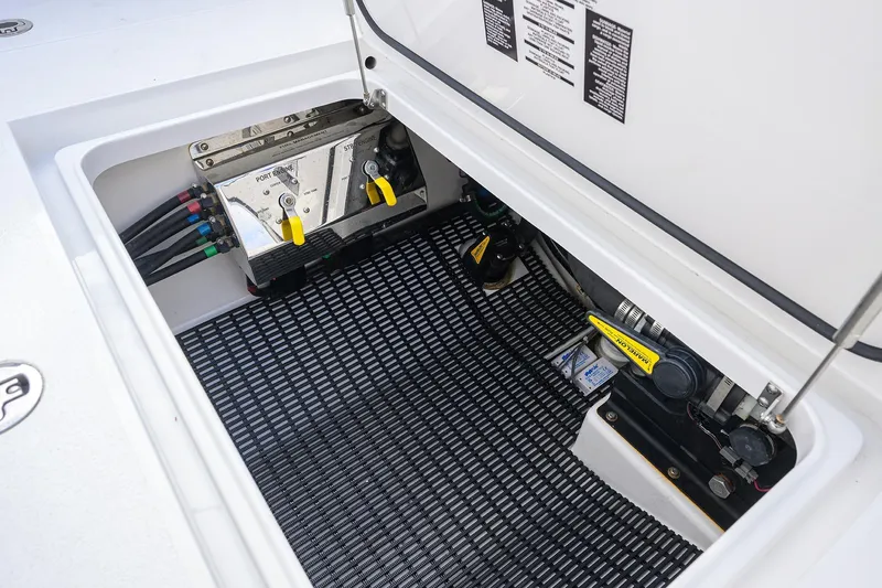 Slide: The Image of Valhalla V-33 2020 boat compartment with control valves and wiring. - 33