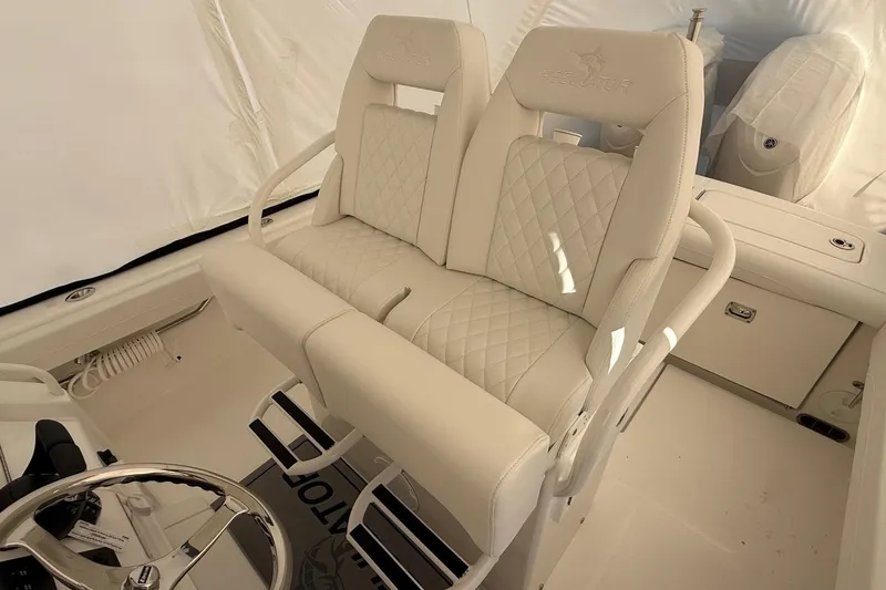 Slide: The Image of Luxurious seating on 2026 Regulator 23 boat, featuring elegant diamond-stitched upholstery. - 36