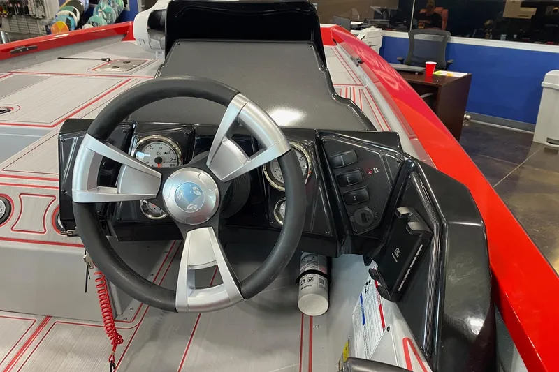 Slide: The Image of Steering console of 2026 G3 Sportsman 1710 SE boat with modern controls. - 5