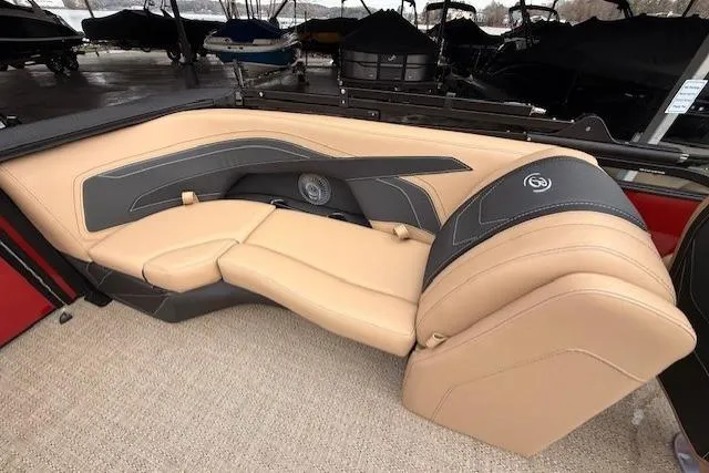 Slide: The Image of 2026 Barletta C22QC boat interior with luxurious tan and black seating. - 13