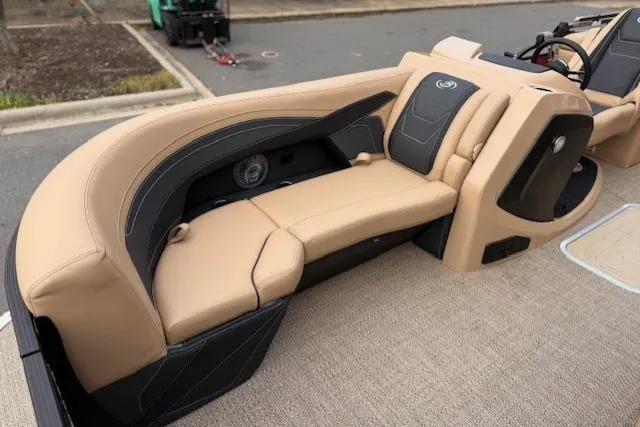 Slide: The Image of Luxurious seating on 2026 Barletta C22QC pontoon boat, featuring beige upholstery and modern design. - 2