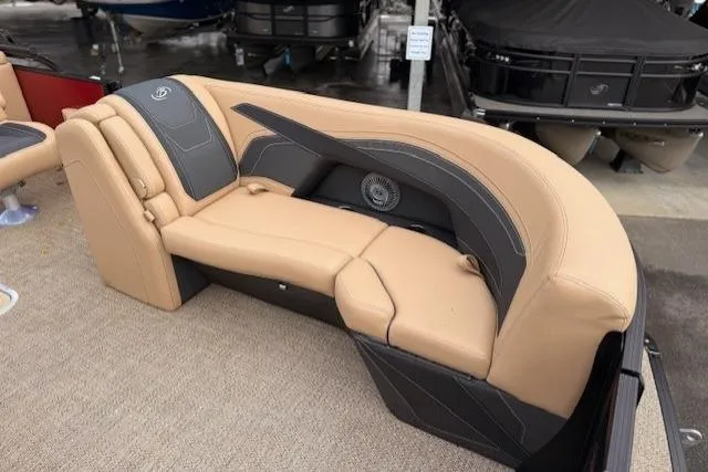 Slide: The Image of Luxurious seating on 2026 Barletta C22QC pontoon boat, featuring beige and black upholstery. - 3
