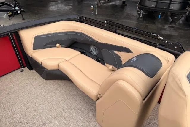 Slide: The Image of Luxurious seating in 2026 Barletta C22QC pontoon boat with beige and gray upholstery. - 6