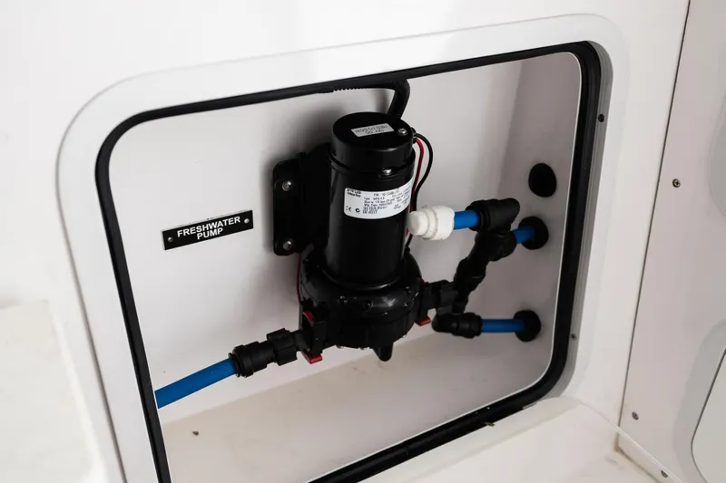Slide: The Image of Freshwater pump system in 2019 Mag Bay 33 CC boat. - 31