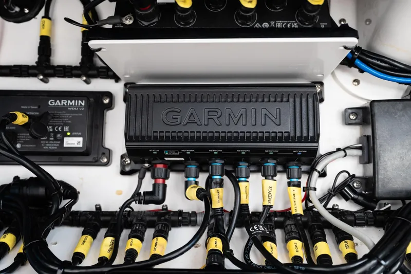 Slide: The Image of Garmin electronics system in 2019 Mag Bay 33 CC boat, showcasing wiring and connections. - 40