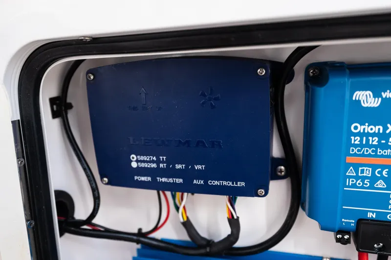 Slide: The Image of Electrical components inside a 2019 Mag Bay 33 CC boat, featuring Lewmar and Orion equipment. - 50