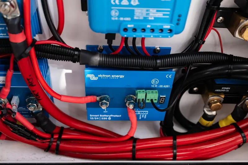 Slide: The Image of Electrical system of 2019 Mag Bay 33 CC featuring Victron Energy components. - 54
