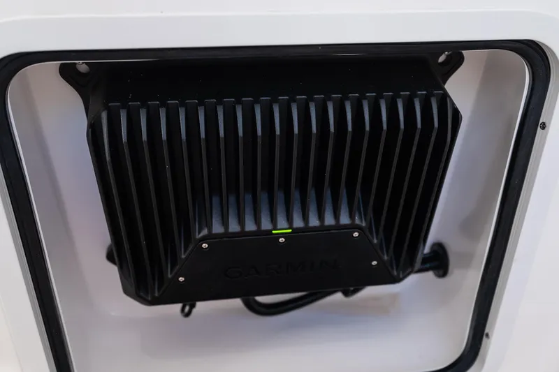 Slide: The Image of Garmin device installed on 2019 Mag Bay 33 CC boat, showcasing advanced marine technology. - 55