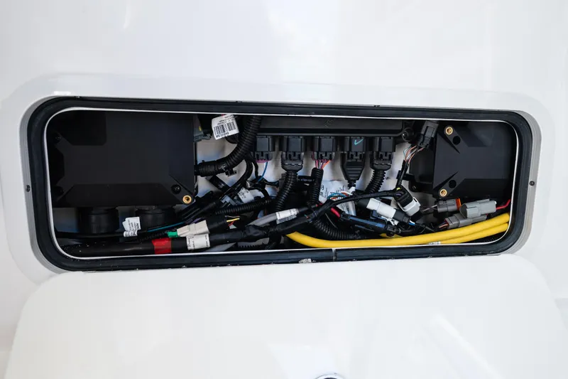 Slide: The Image of Electrical wiring compartment of 2019 Mag Bay 33 CC boat. - 56