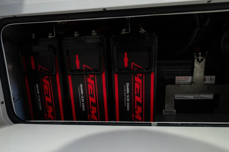 Slide: The Image of Battery compartment of 2019 Mag Bay 33 CC boat with Helix lithium batteries. - 58