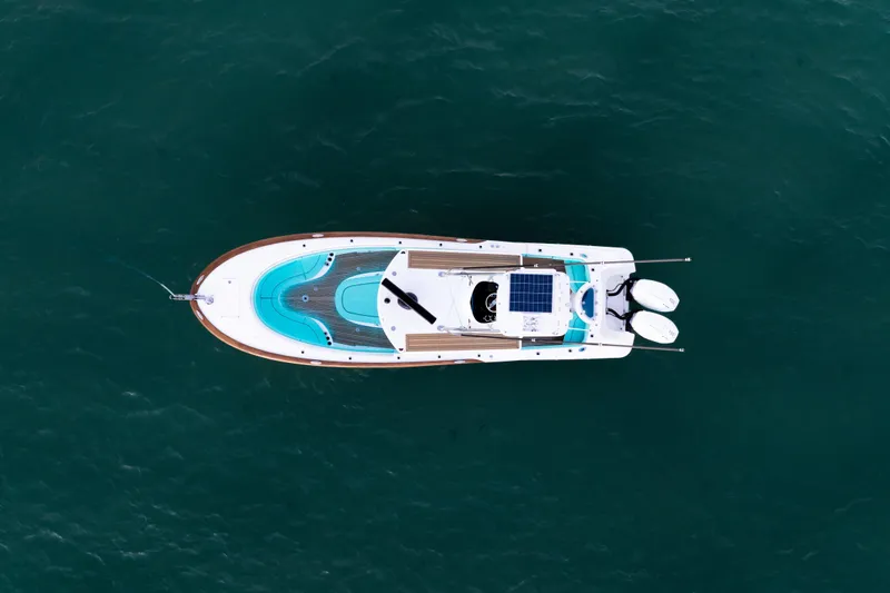 Slide: The Image of Overhead view of 2019 Mag Bay 33 CC boat on open water. - 8