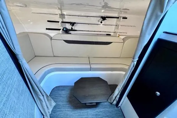 Slide: The Image of Interior of 2022 Stamas 370 Aegean boat with seating and fishing rods. - 14