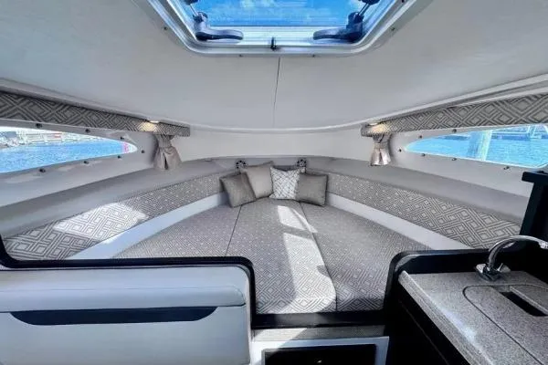 Slide: The Image of Luxurious interior of 2022 Stamas 370 Aegean yacht with elegant seating and skylight. - 16