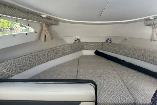 Slide: The Image of Interior cabin of 2022 Stamas 370 Aegean boat with patterned seating and windows. - 17