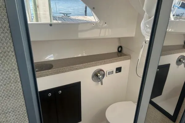 Slide: The Image of 2022 Stamas 370 Aegean boat interior bathroom with modern fixtures and window view. - 20