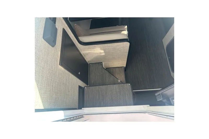 Slide: The Image of Interior view of 2022 Stamas 370 Aegean boat, featuring modern seating and flooring. - 29