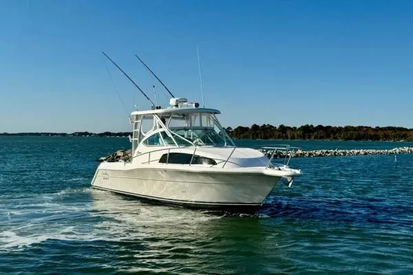 Slide: The Image of 2022 Stamas 370 Aegean boat cruising on a sunny day in open water. - 3