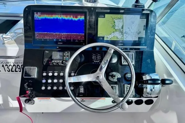 Slide: The Image of Helm of 2022 Stamas 370 Aegean boat with navigation screens and controls. - 30