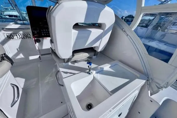 Slide: The Image of 2022 Stamas 370 Aegean boat interior with helm seat and sink, showcasing modern design. - 32
