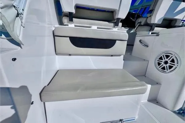 Slide: The Image of 2022 Stamas 370 Aegean boat interior with cushioned seating and speaker. - 33