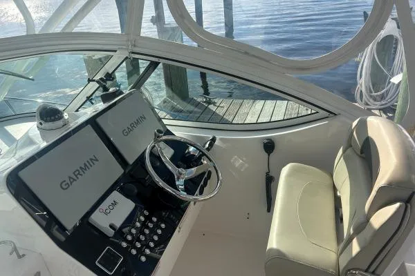 Slide: The Image of 2022 Stamas 370 Aegean boat cockpit with Garmin navigation system and comfortable seating. - 37