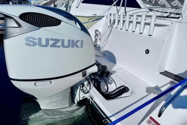 Slide: The Image of 2022 Stamas 370 Aegean boat with Suzuki outboard motor, docked at marina. - 51