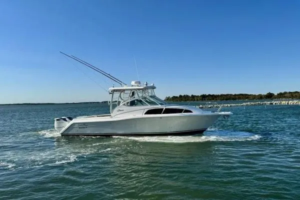 Slide: The Image of 2022 Stamas 370 Aegean boat cruising on open water under clear blue sky. - 57