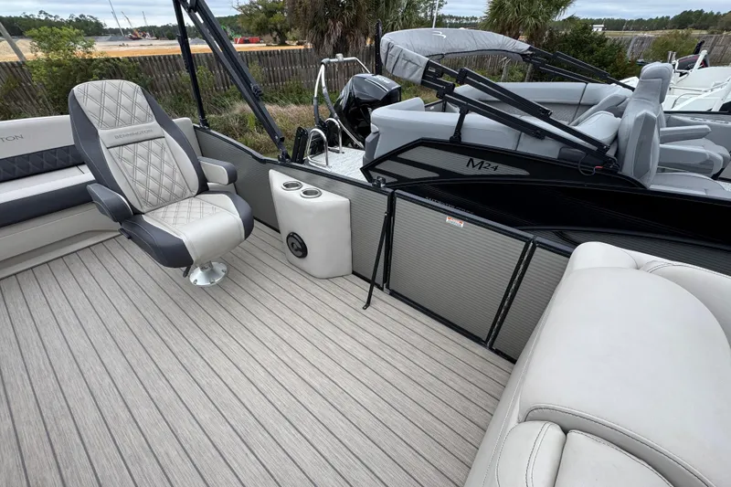 Slide: The Image of 2019 Bennington 25 RSBDN boat interior with luxury seating and modern design. - 18