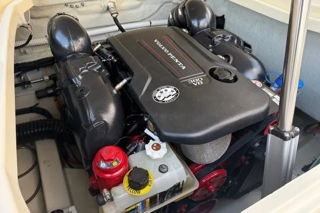 Slide: The Image of 2022 Chris-Craft Launch 25 GT engine compartment showcasing powerful V8 engine. - 19
